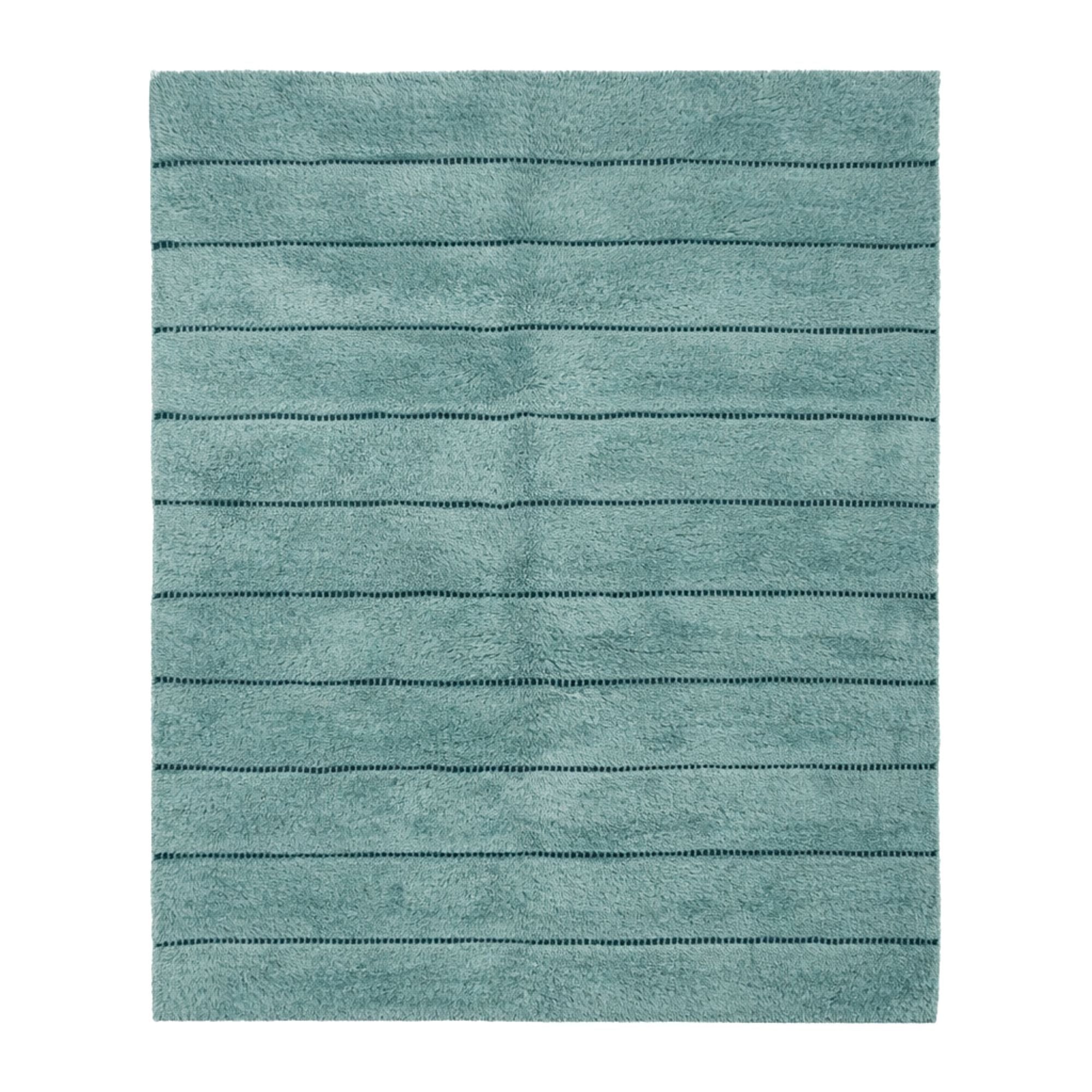 Brume No. 01 handmade light blue Moroccan wool rug with subtle linear detailing