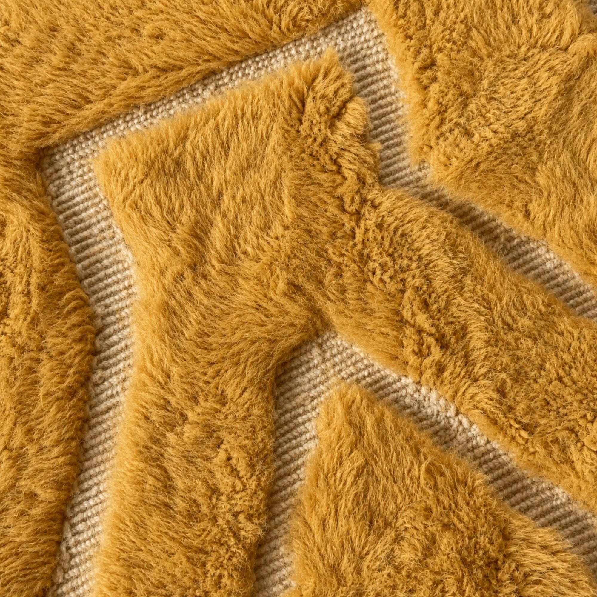 Close-up of Sahara Symphony No. 02 showing the plush high-pile wool texture and sculptural handcrafted details.