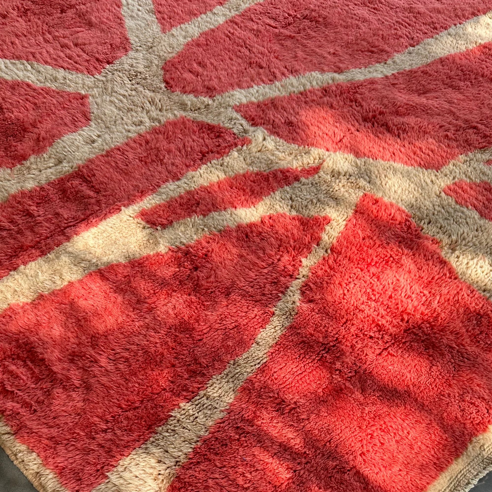 Close-up of plush wool texture on luxury Moroccan rug.