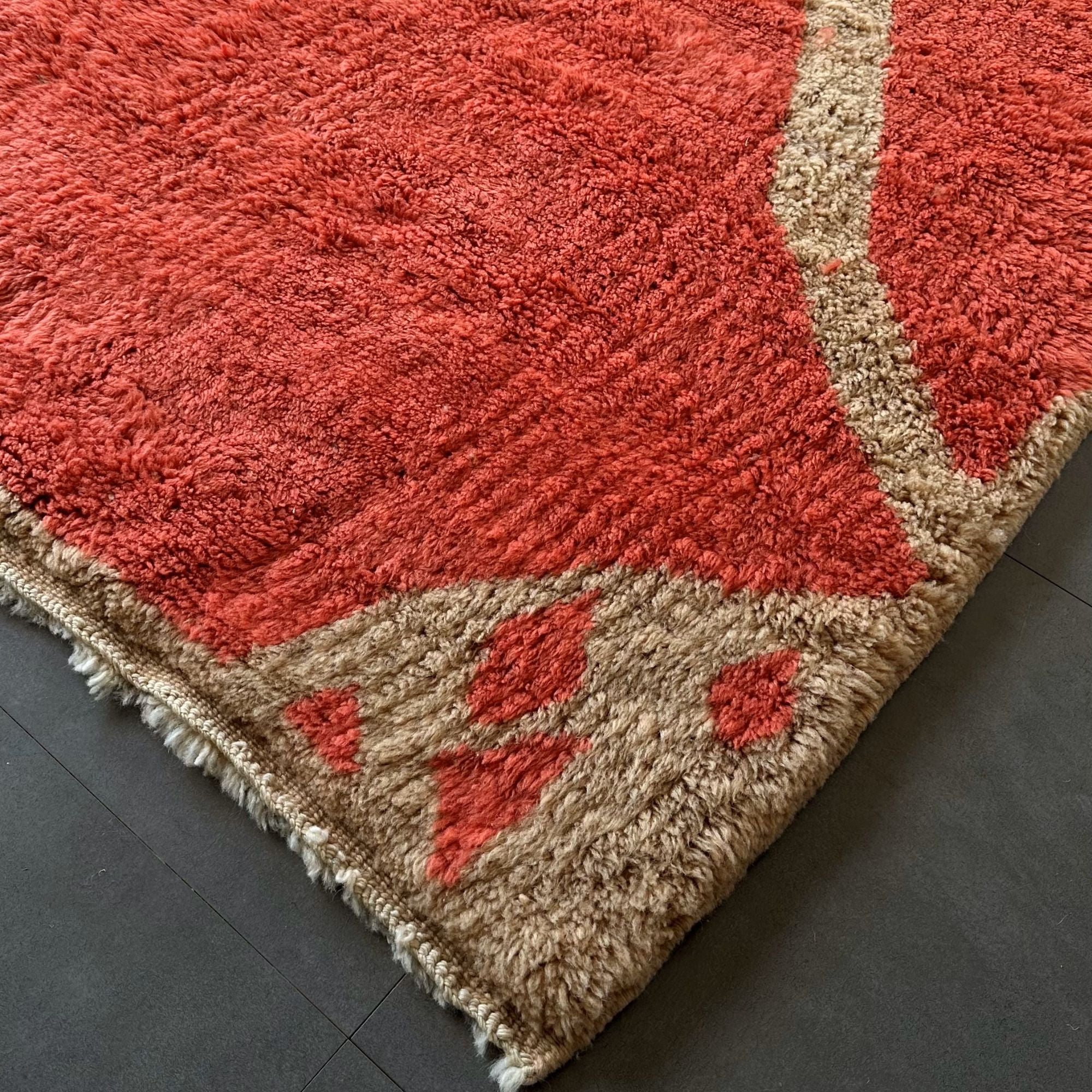 Hand-knotted Moroccan rug showcasing intricate detailing and texture.
