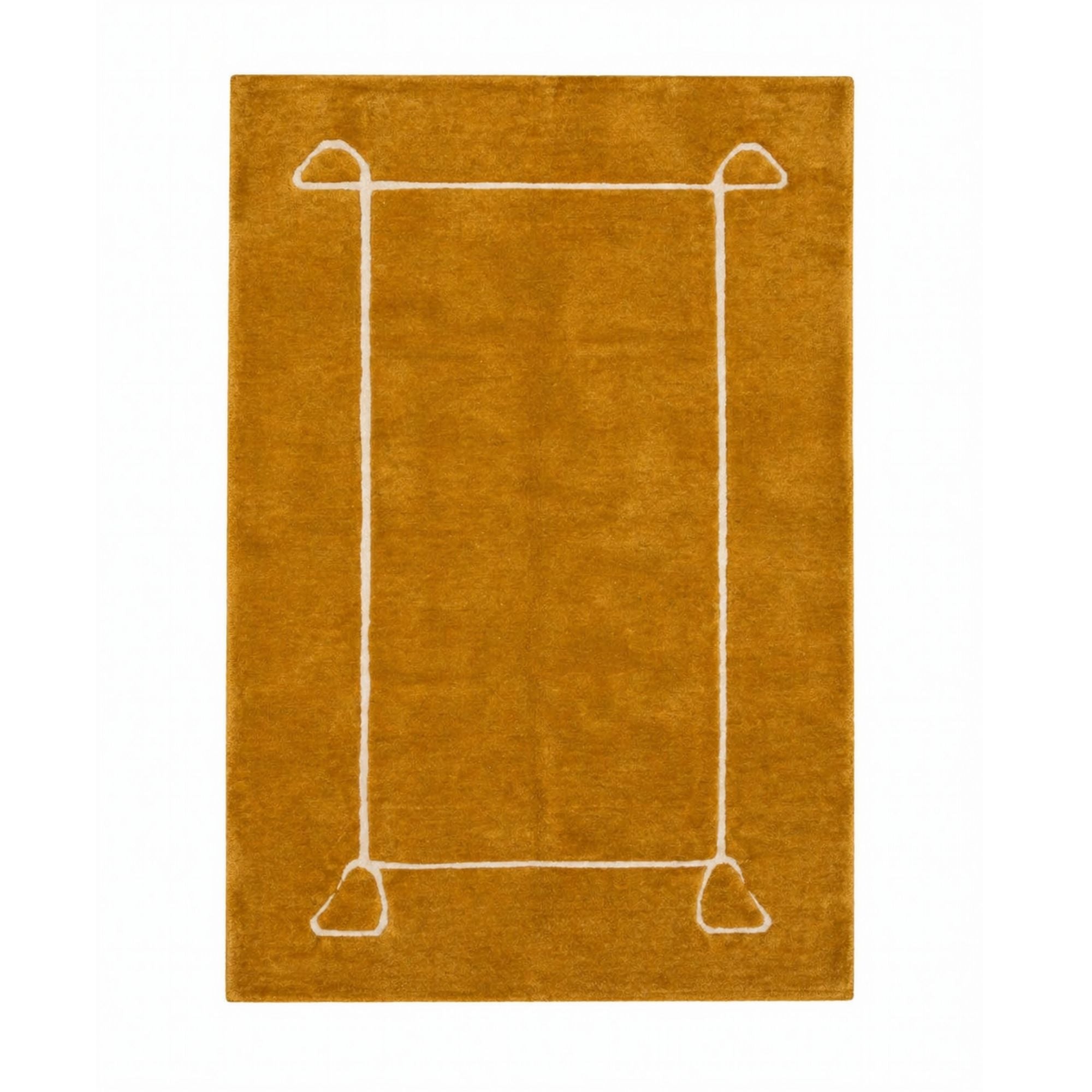 Handwoven Moroccan saffron wool rug with minimalist ivory frame design, modern Berber rug, high pile texture