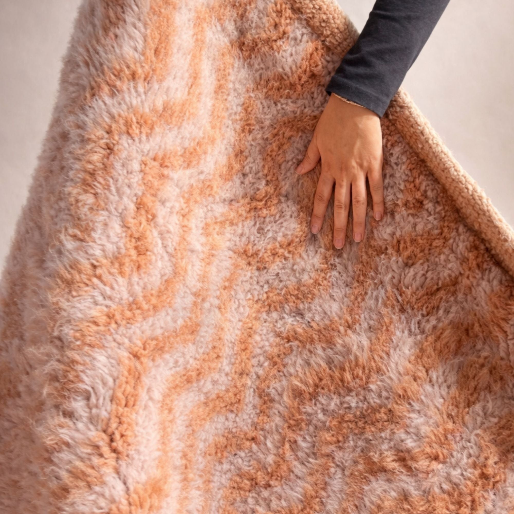 Handwoven Moroccan wool rug, Haze design from collection, plush high-pile texture, hand-felt detail.