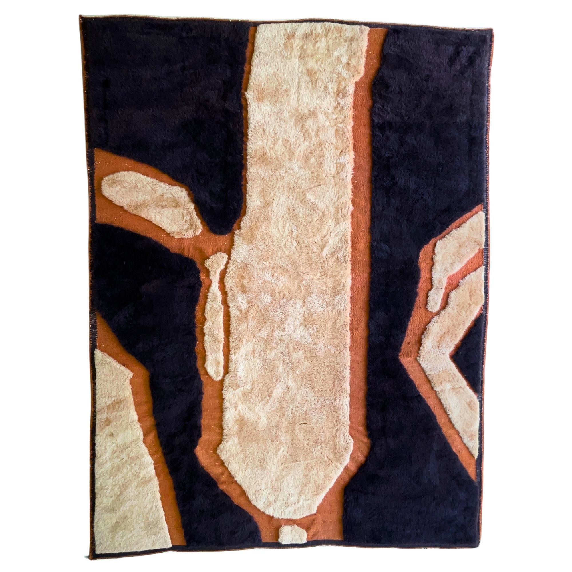 Handwoven Moroccan wool rug, Totem no. 01 design, sculptural cream and black shapes on rust ground, high-pile texture.