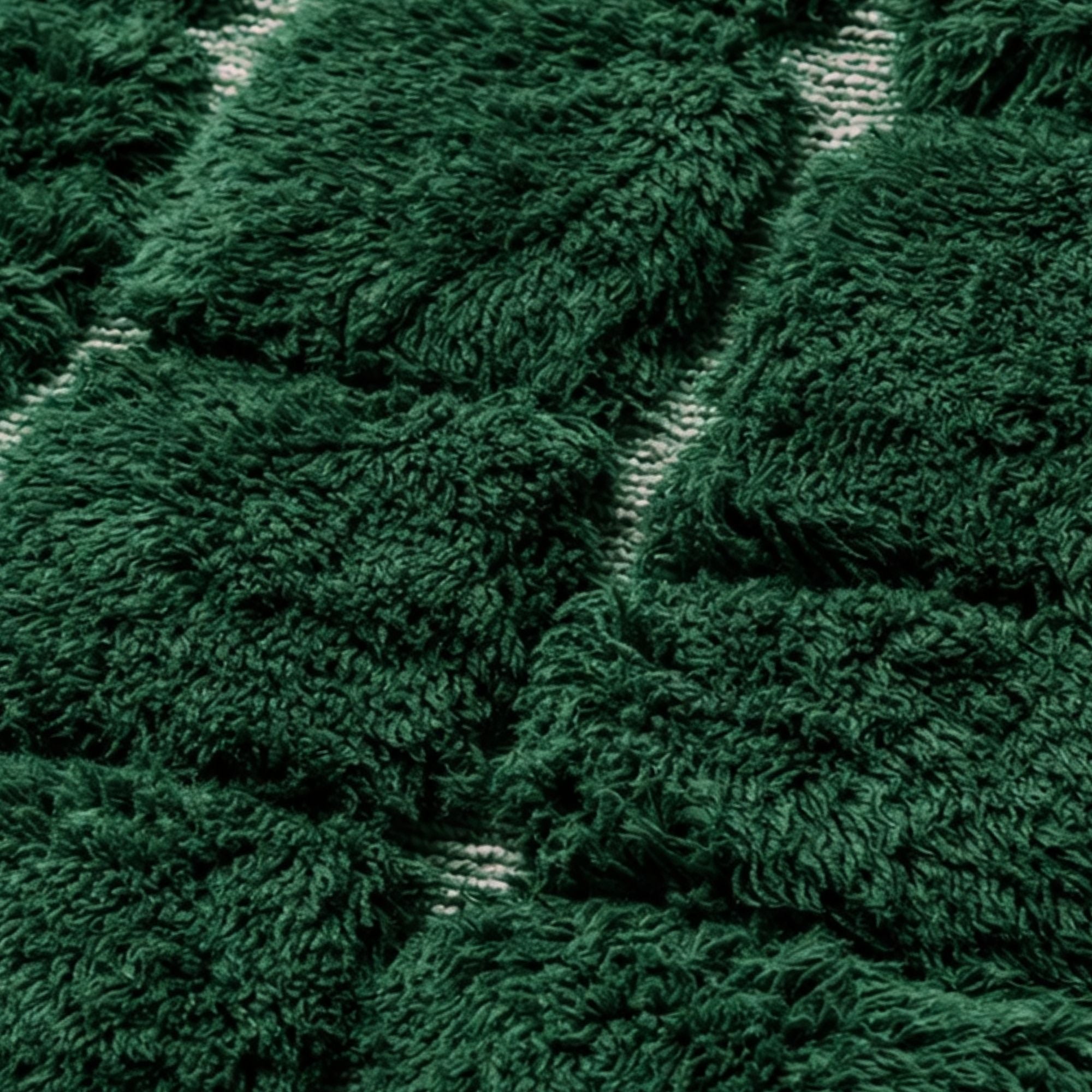 Handwoven Moroccan wool rug, Understory design, plush green wool pile close-up, hand-knotted texture.
