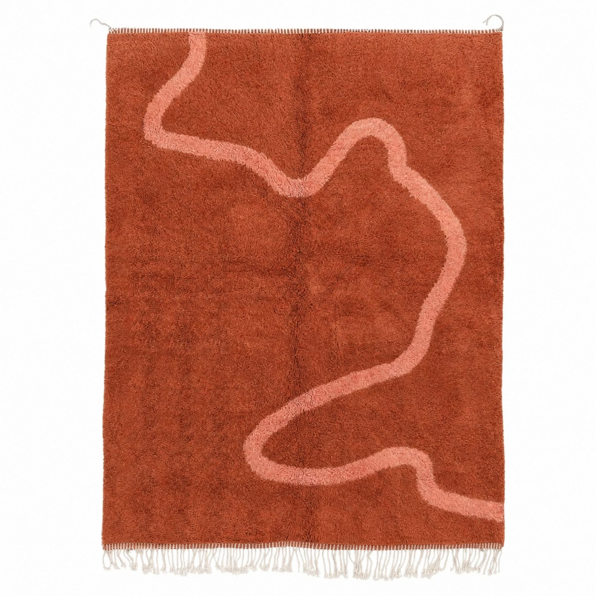 Marea No. 01 handmade terracotta Moroccan wool rug with blush pink abstract line