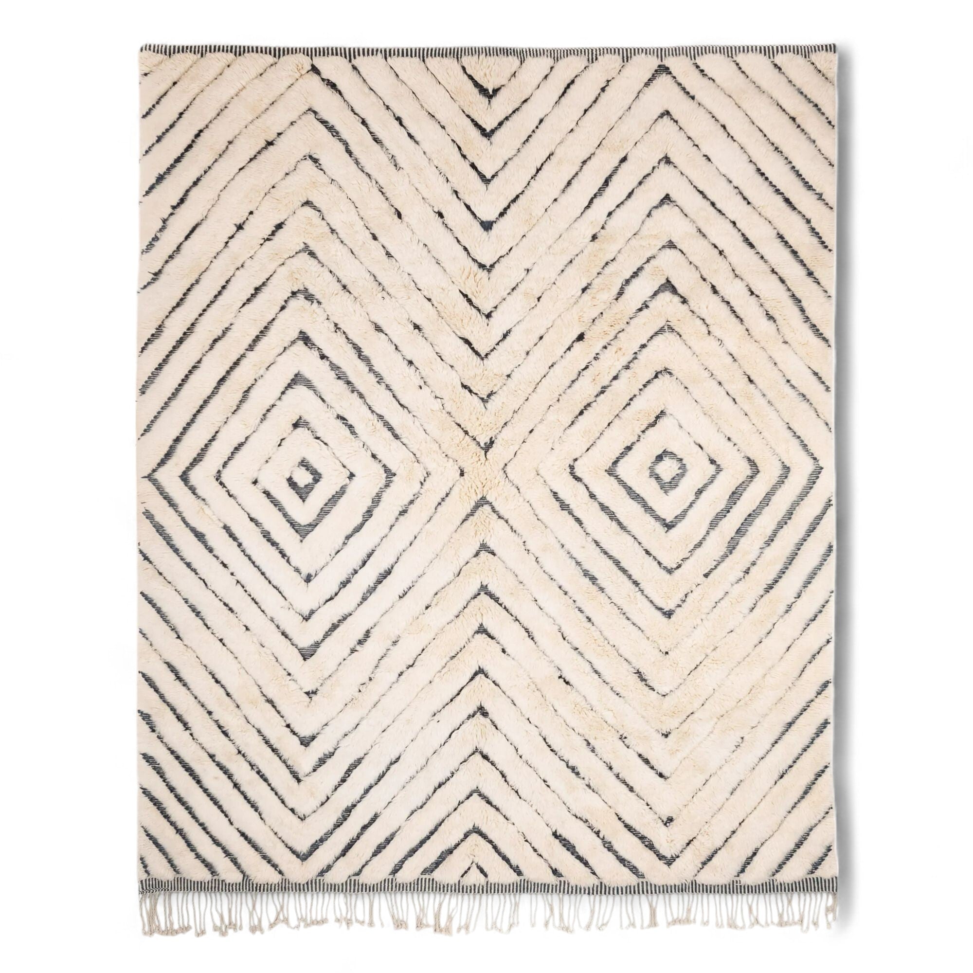 Berber Boulevards white Moroccan rug with a textured black diamond design, handwoven by Berber artisans.