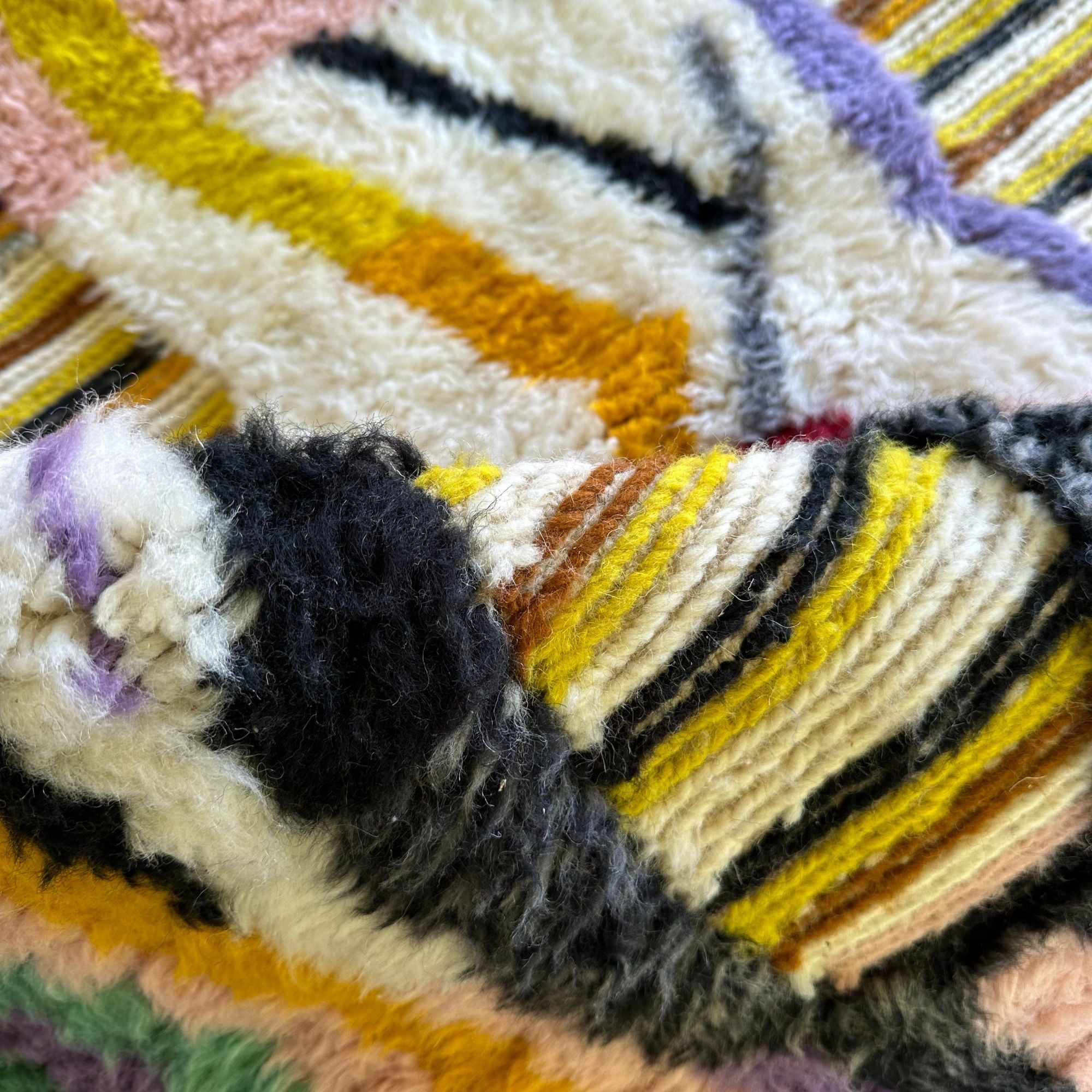 Berber Odyssey Berber area rug in stock with a vibrant multicolor and textured design, handwoven by Berber artisans