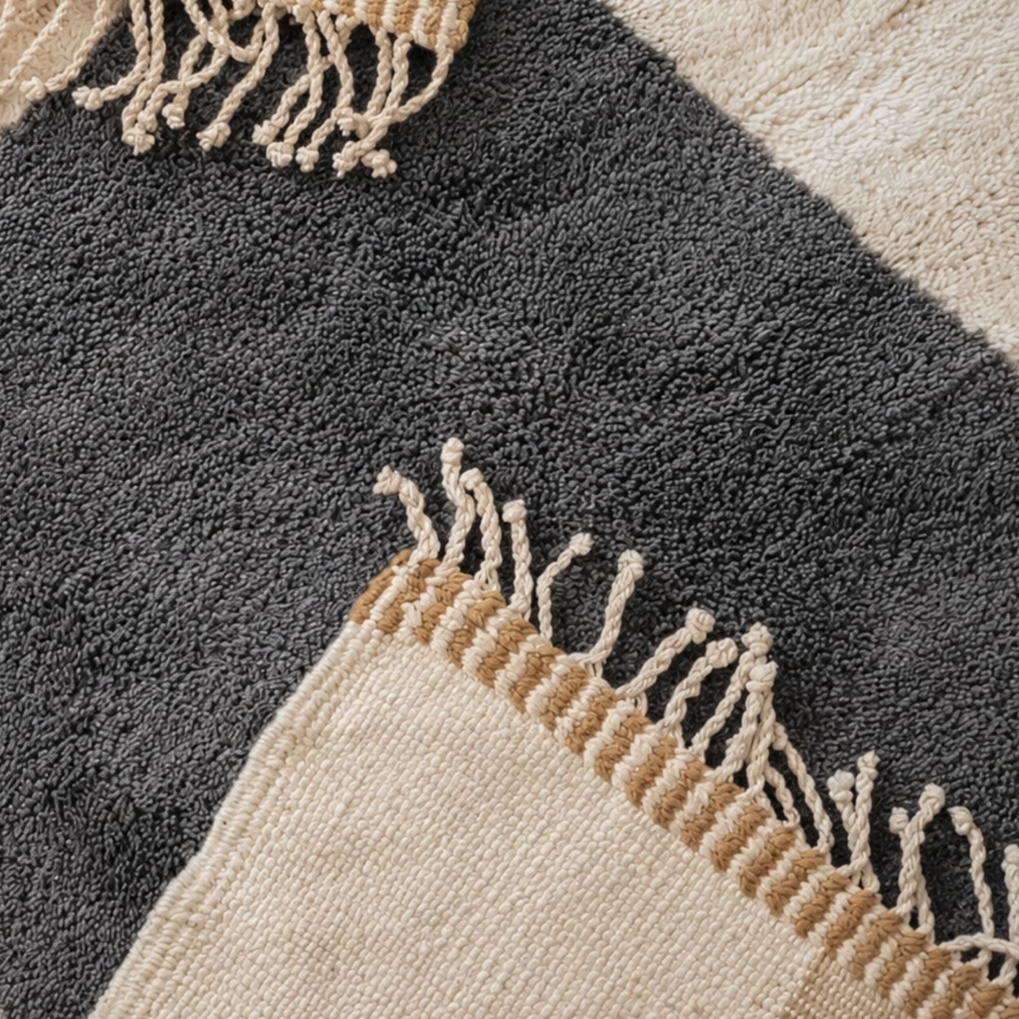 Camel ivory and charcoal geometric Moroccan rug showing natural wool texture