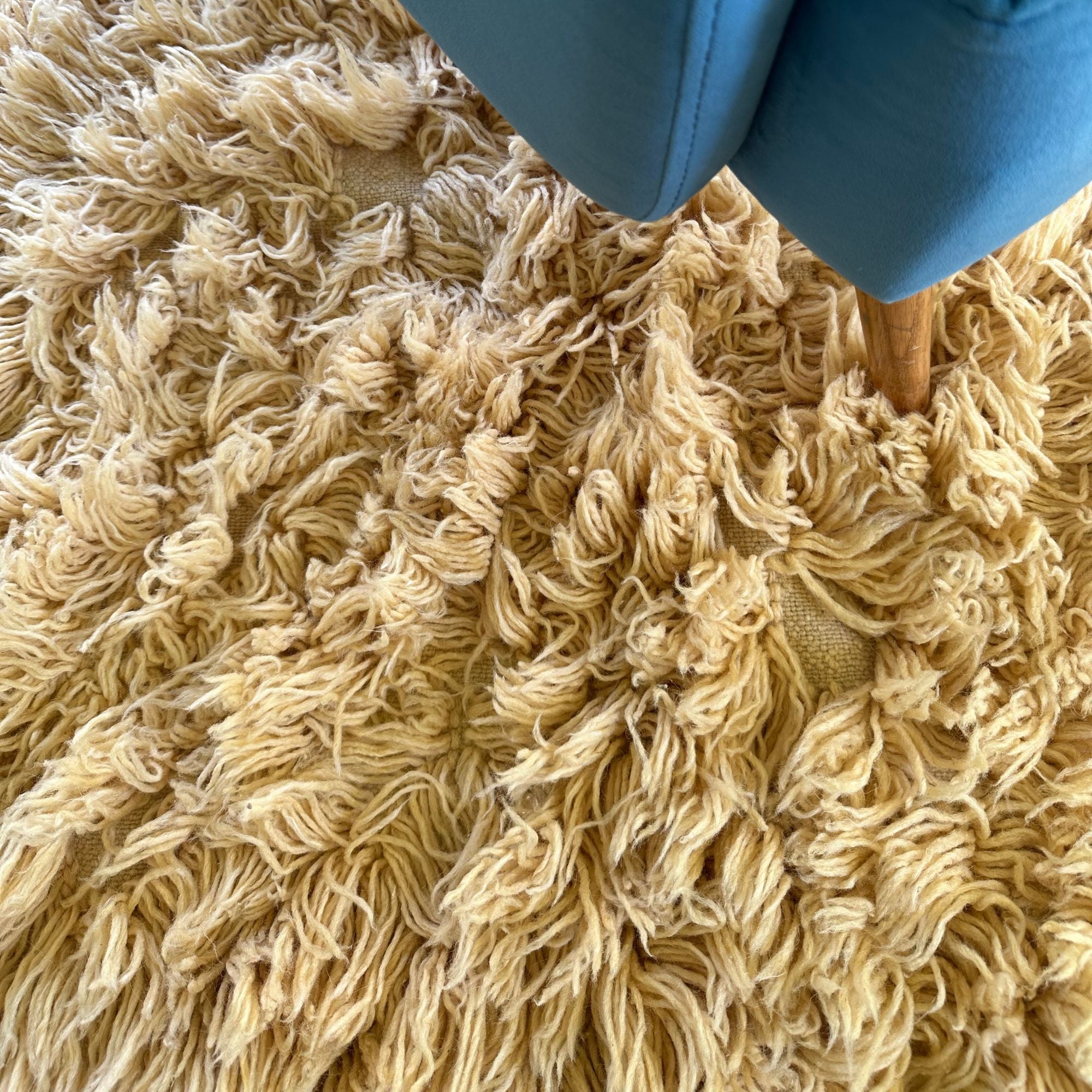 Celestial Charm high pile Moroccan rug with a cream color and hidden textured design, handwoven by Berber artisans