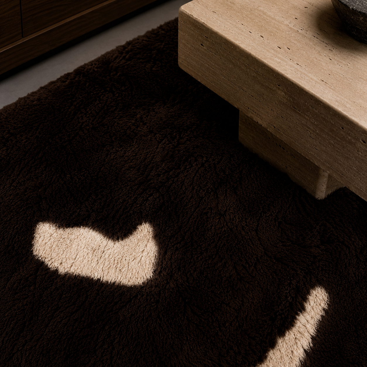 Close-up of Fragment No. 01 beneath a stone coffee table showcasing texture, depth, and tonal variation.