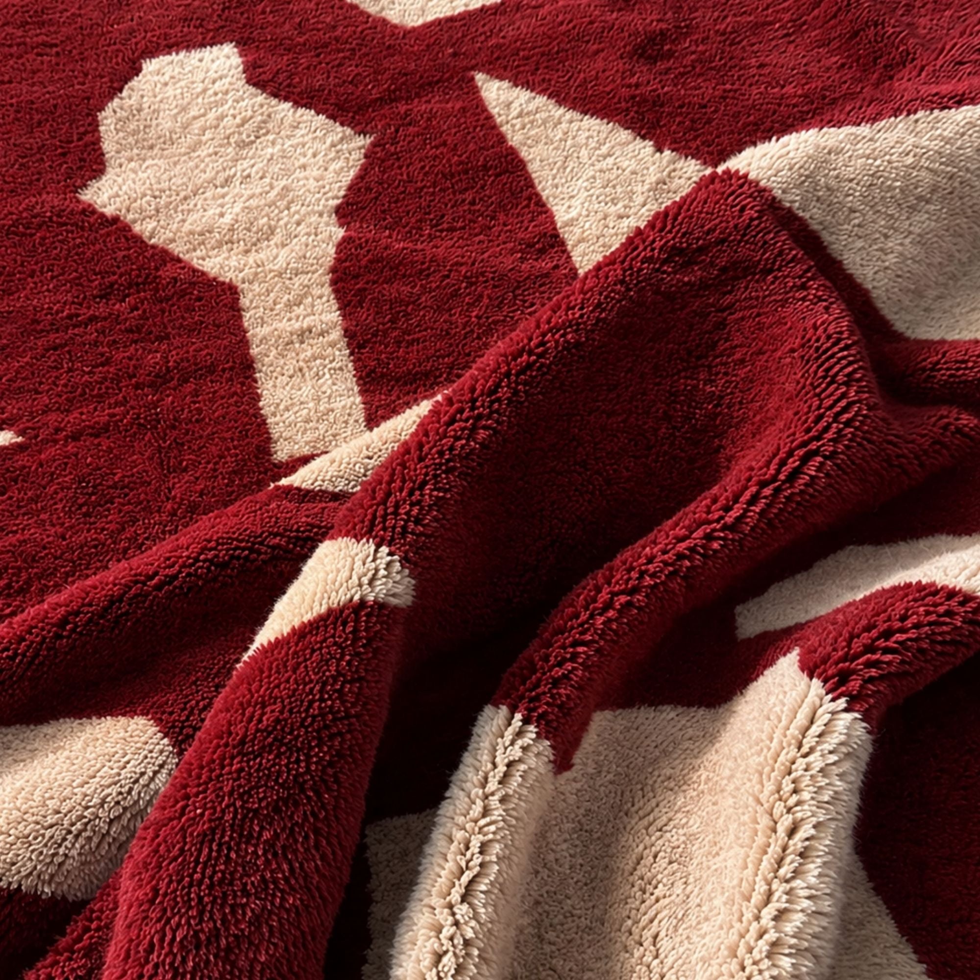 Close-up of Fragment No. 02 Moroccan wool rug showing high-pile oxblood and ivory texture.