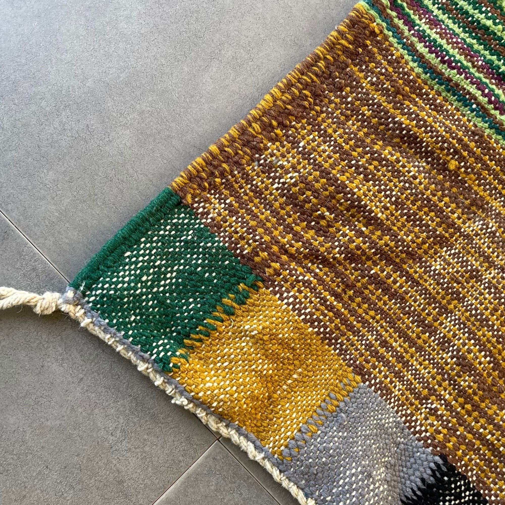 Patchwork Moroccan flatweave rug with hand-finished fringe and colorful natural wool weave