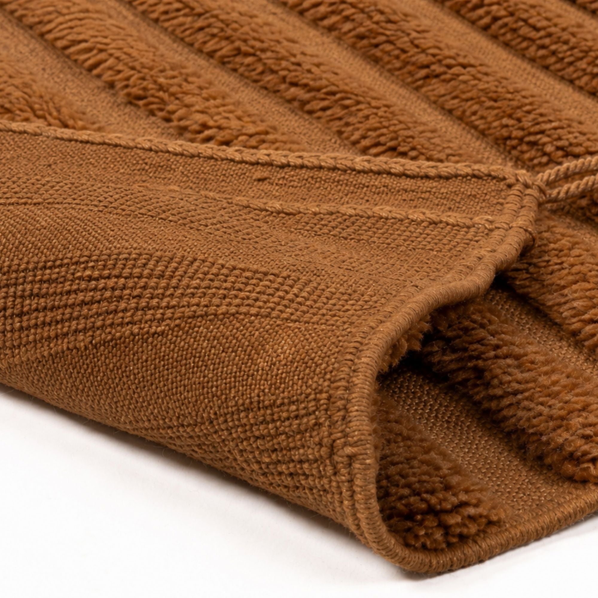 Close-up of Strata No. 01 Moroccan rug showing dense wool weave, soft high pile texture and natural taupe tones
