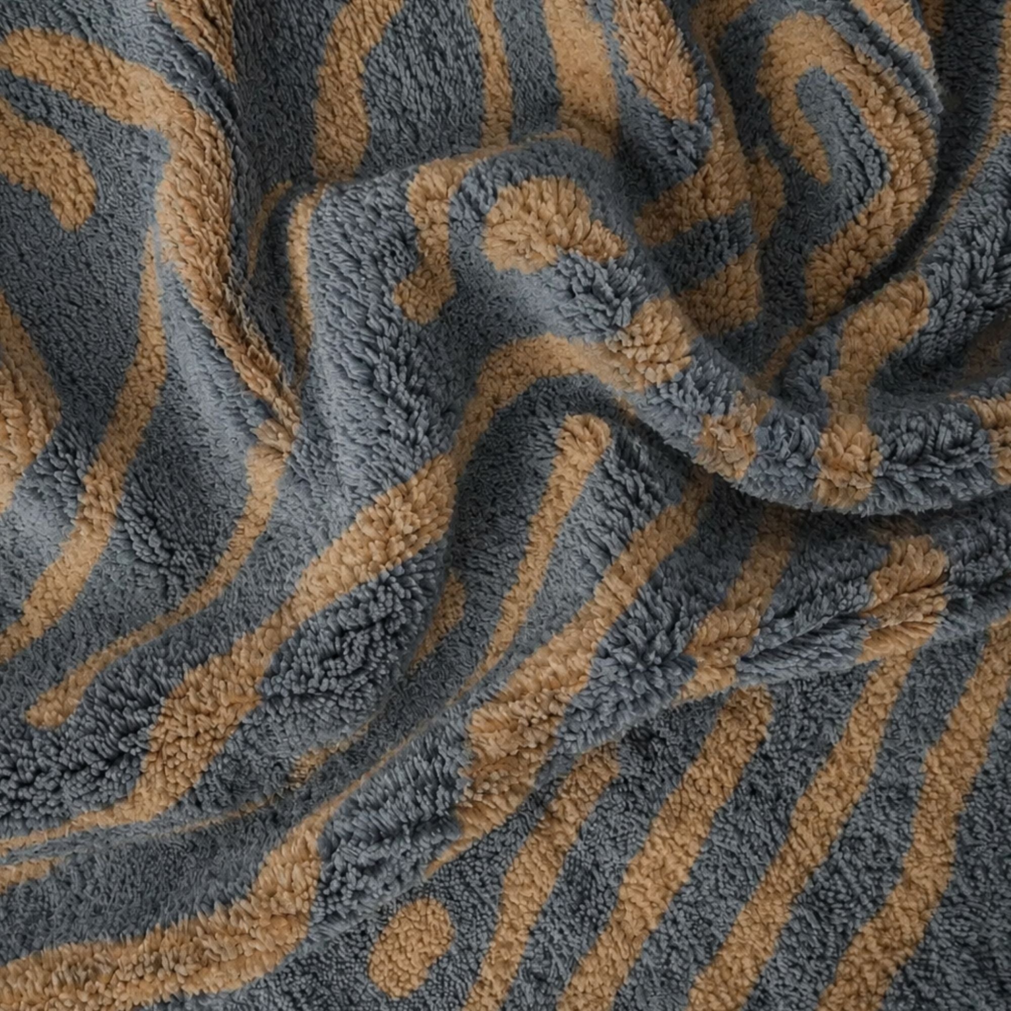 Close-up of Topography No. 01 contemporary Moroccan rug showing soft natural wool pile and camel pattern
