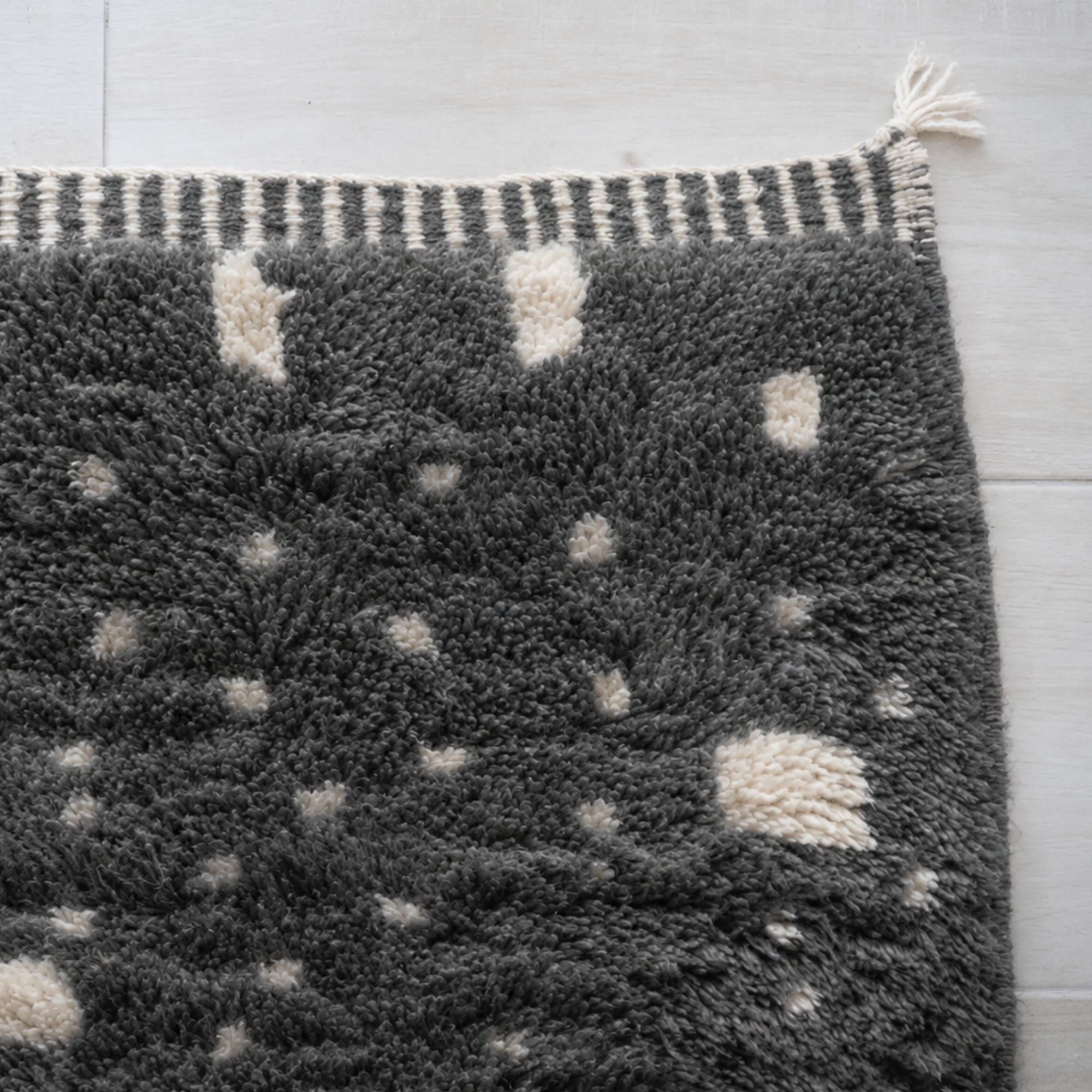 Constellation handmade grey Moroccan rug showing ivory dotted pattern and artisanal wool texture