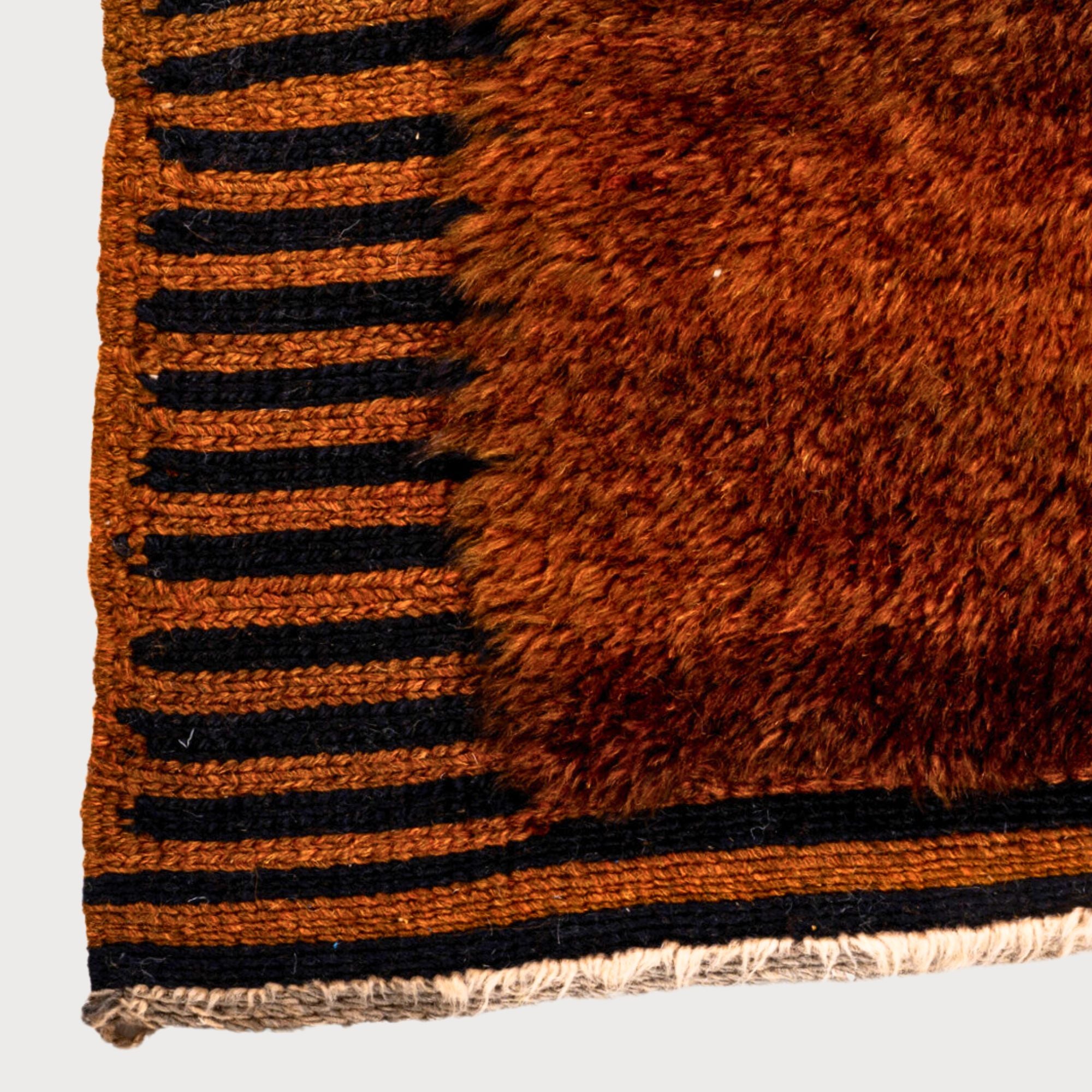 Ethereal Embrace high pile Moroccan rug with a brown base, black stripes, and flat edges, handwoven by Berber artisans