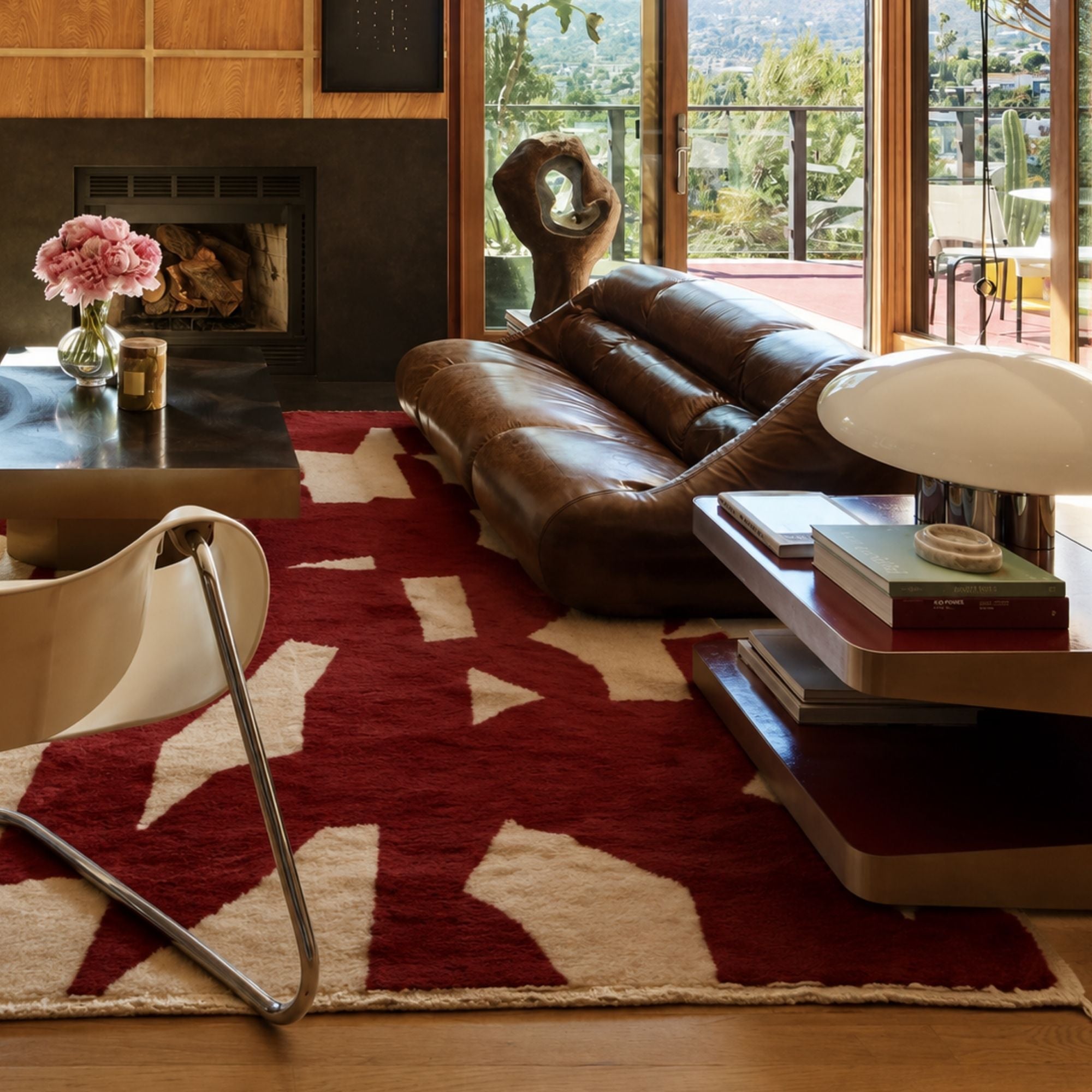 Fragment No. 02 handmade Moroccan wool rug styled in a wood-paneled living room with a brown leather sofa.