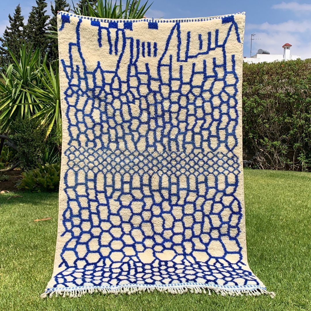 Whispering Willow Moroccan shag rug with a blue honeycomb design, handwoven by Berber artisans