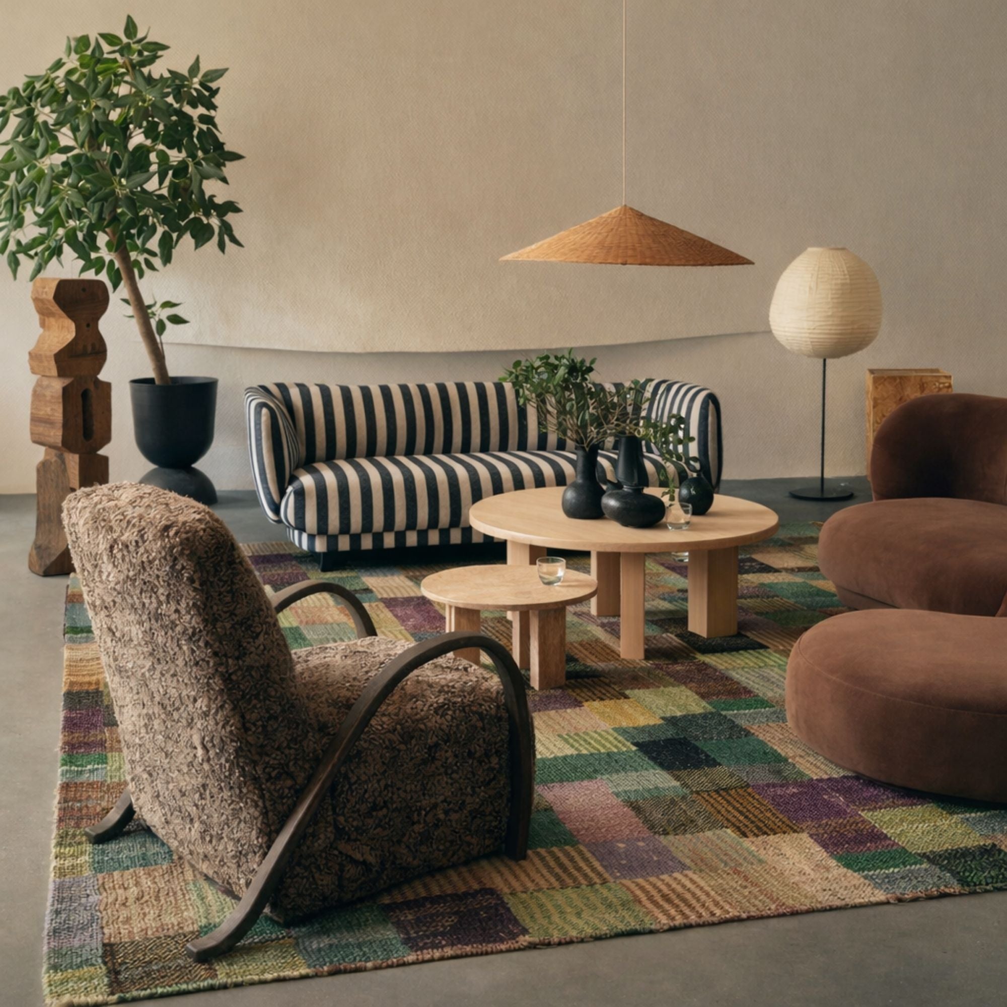 Colorful Moroccan flatweave rug styled in a contemporary living room with warm natural materials