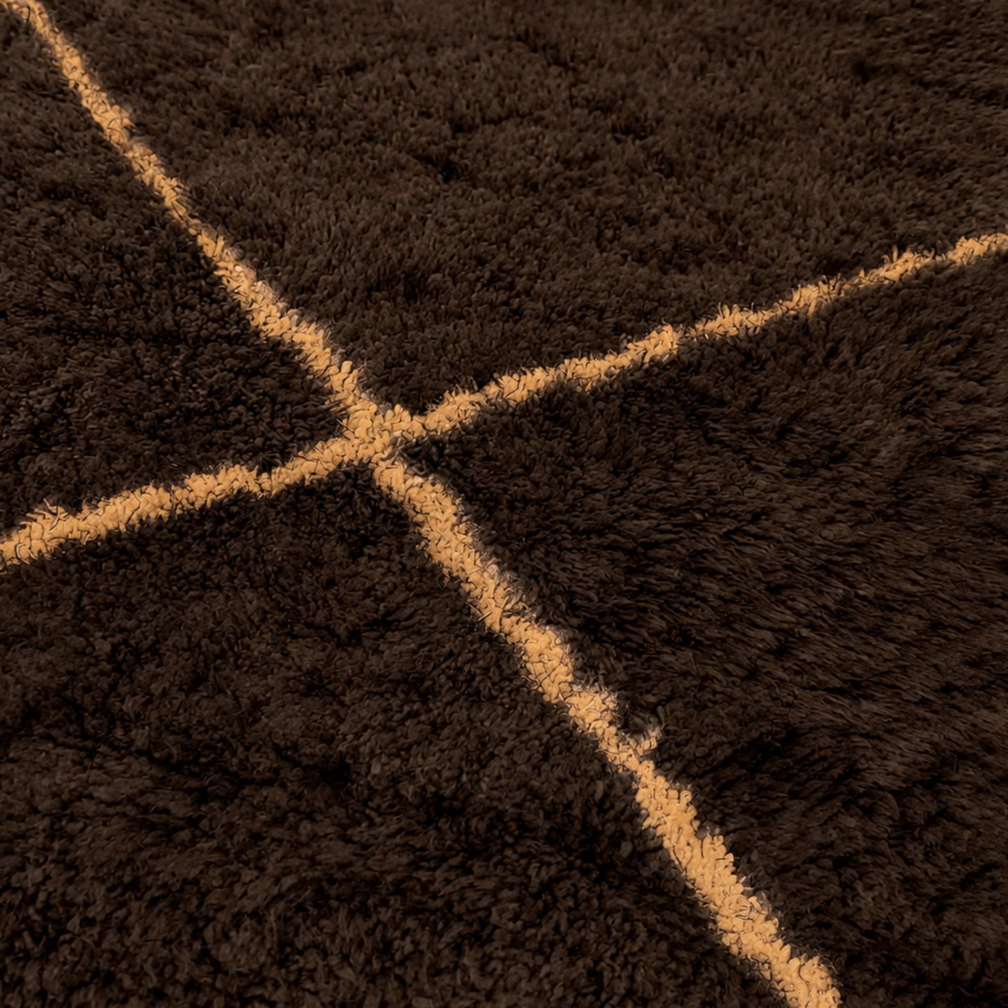Handmade chocolate brown Moroccan wool rug with camel geometric line detail