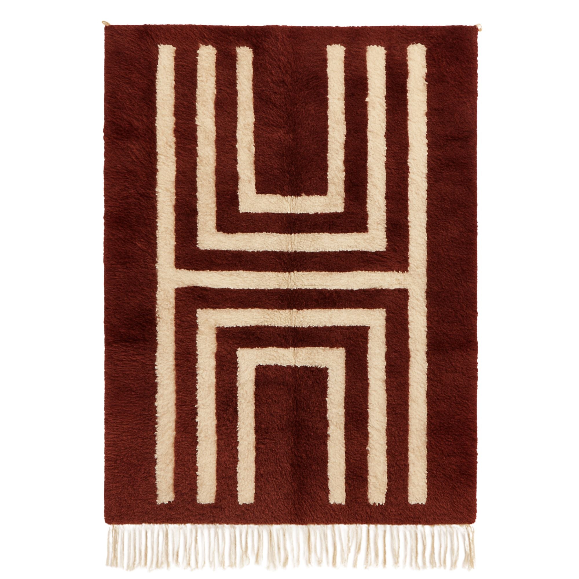 Handwoven Moroccan rug in oxblood red and off-white geometric pattern, Soft Geometry collection, Ember Steps design, high-pile wool with tassel fringe.