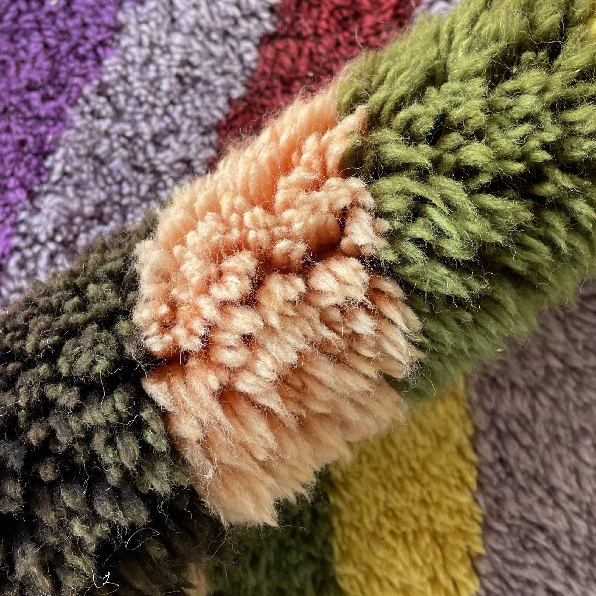 Handwoven Moroccan wool rug, Chorus design, close-up of high-pile wool color blocks.