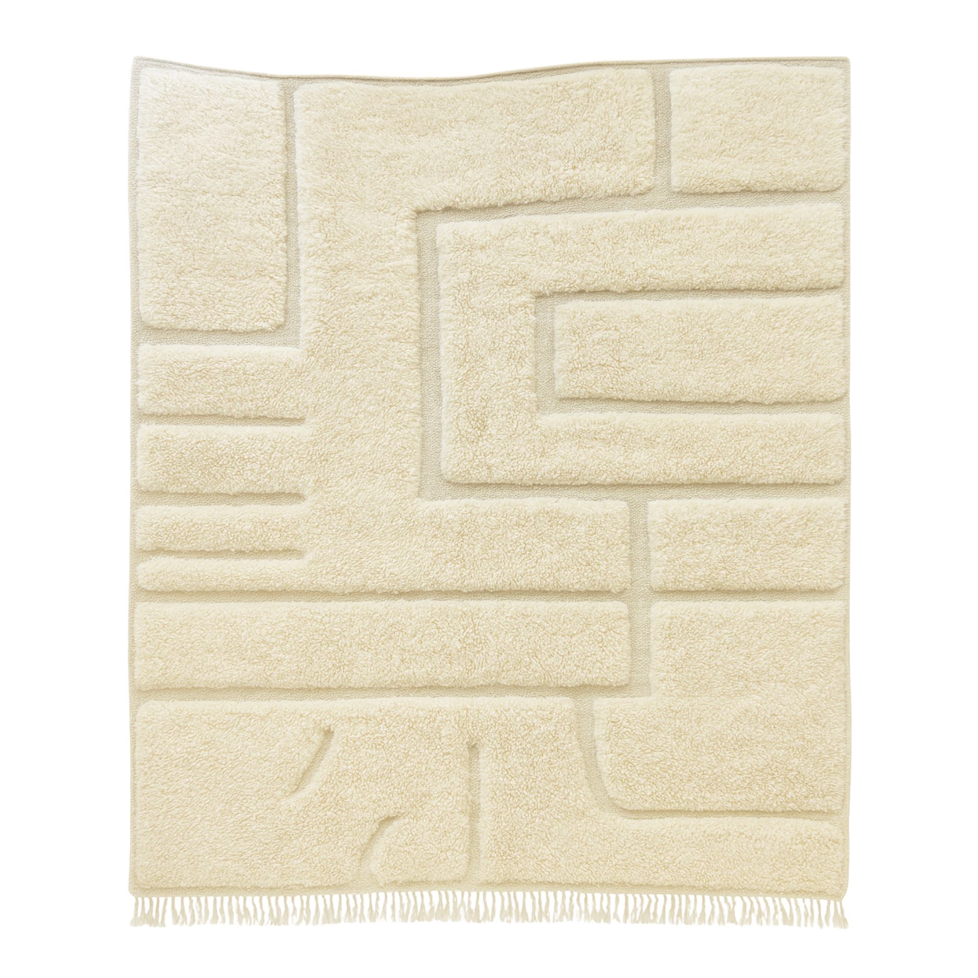 Handwoven Moroccan wool rug, Echo Loops design from Tactile Reverie collection, ivory background with carved concentric oval patterns, high-pile texture with flatwoven base, artisanal craftsmanship.