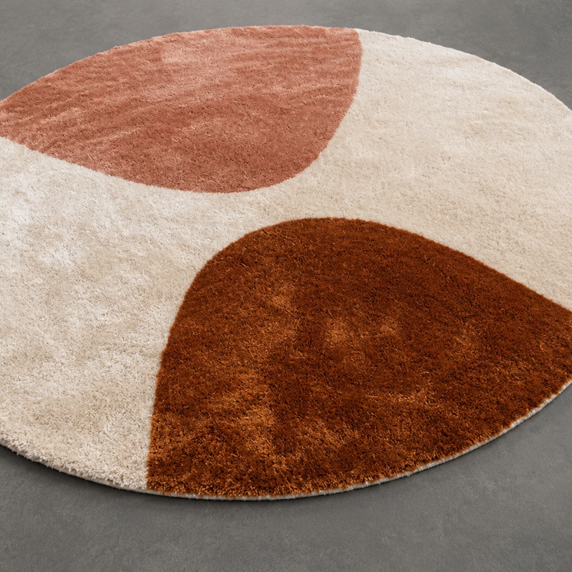 Handwoven Moroccan wool rug, Cove design, close-up of rust-orange shape and high-pile ivory texture.