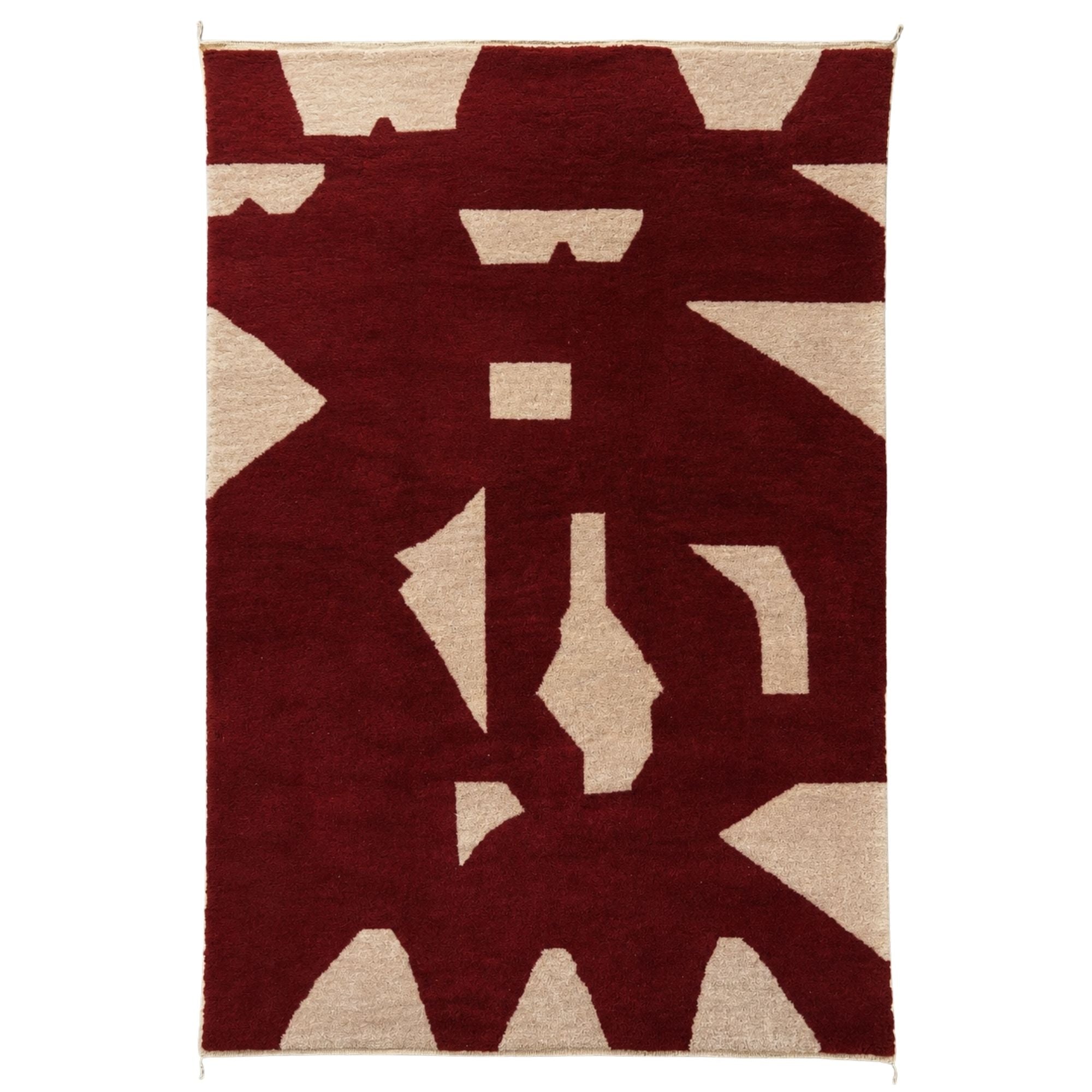 Handwoven Moroccan wool rug, Fragment No. 02 design, oxblood red field with scattered ivory geometric shapes, high-pile texture.