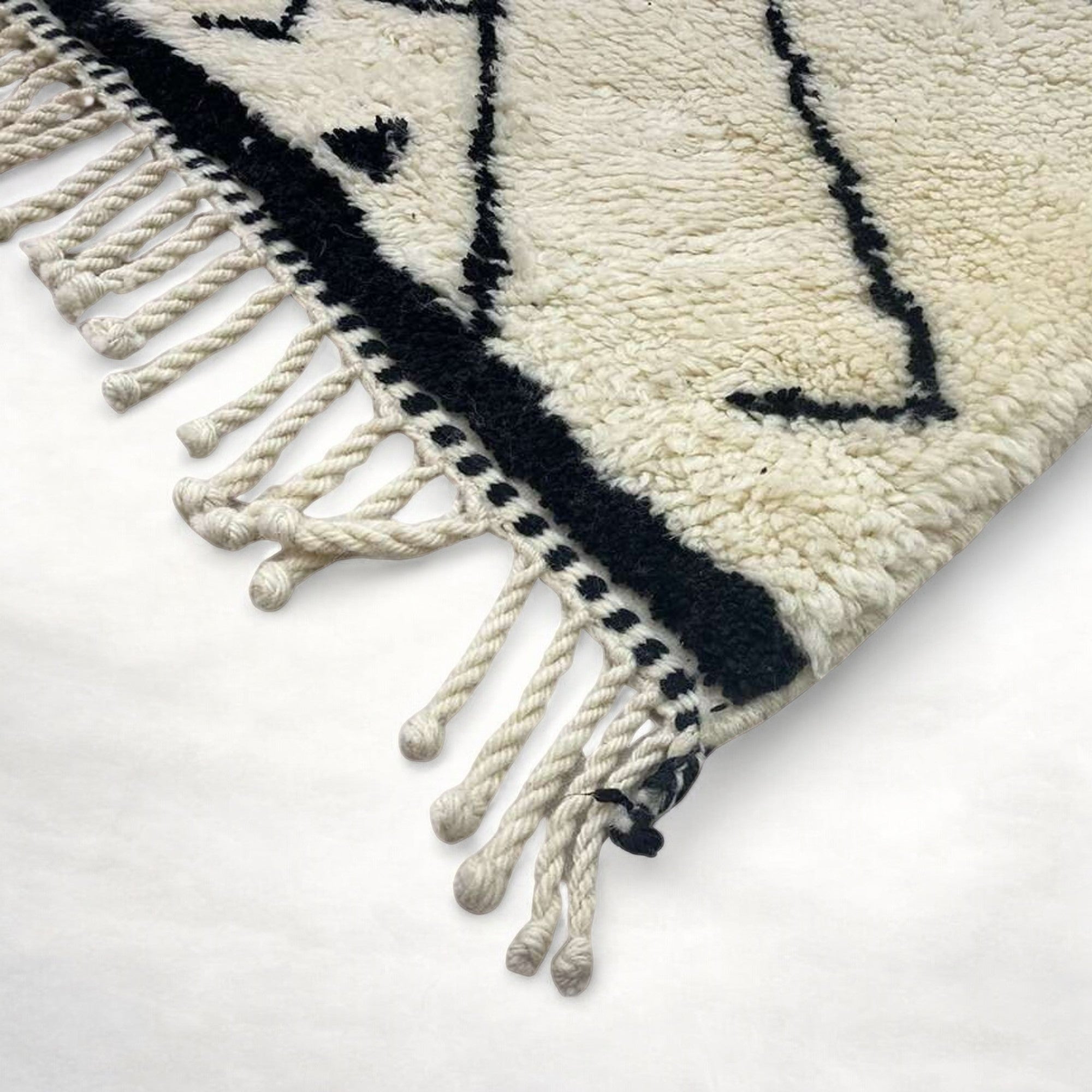 Majestic Dunes white Moroccan rug with mountain designs representing the Atlas Mountains, handwoven by Berber artisans