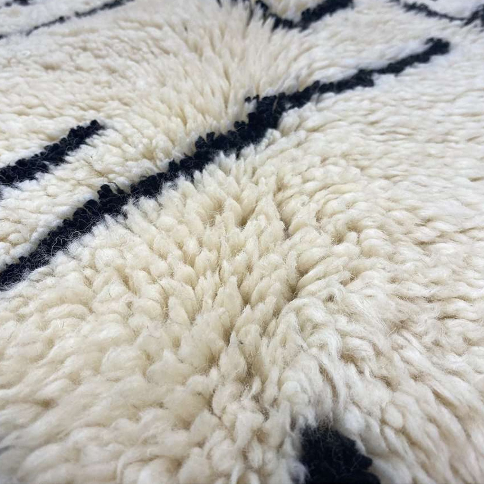 Majestic Dunes white Moroccan rug with mountain designs representing the Atlas Mountains, handwoven by Berber artisans