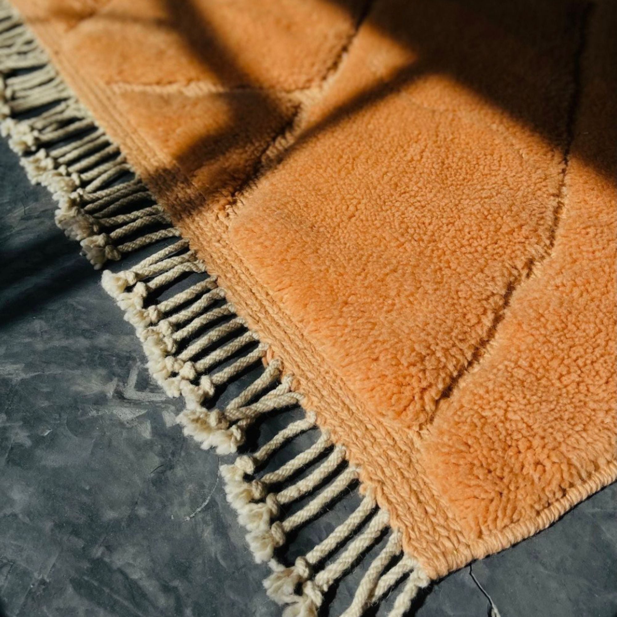 Medina Magic brown Berber rug with a camel brown base and tribal textured design, handwoven by Berber artisans