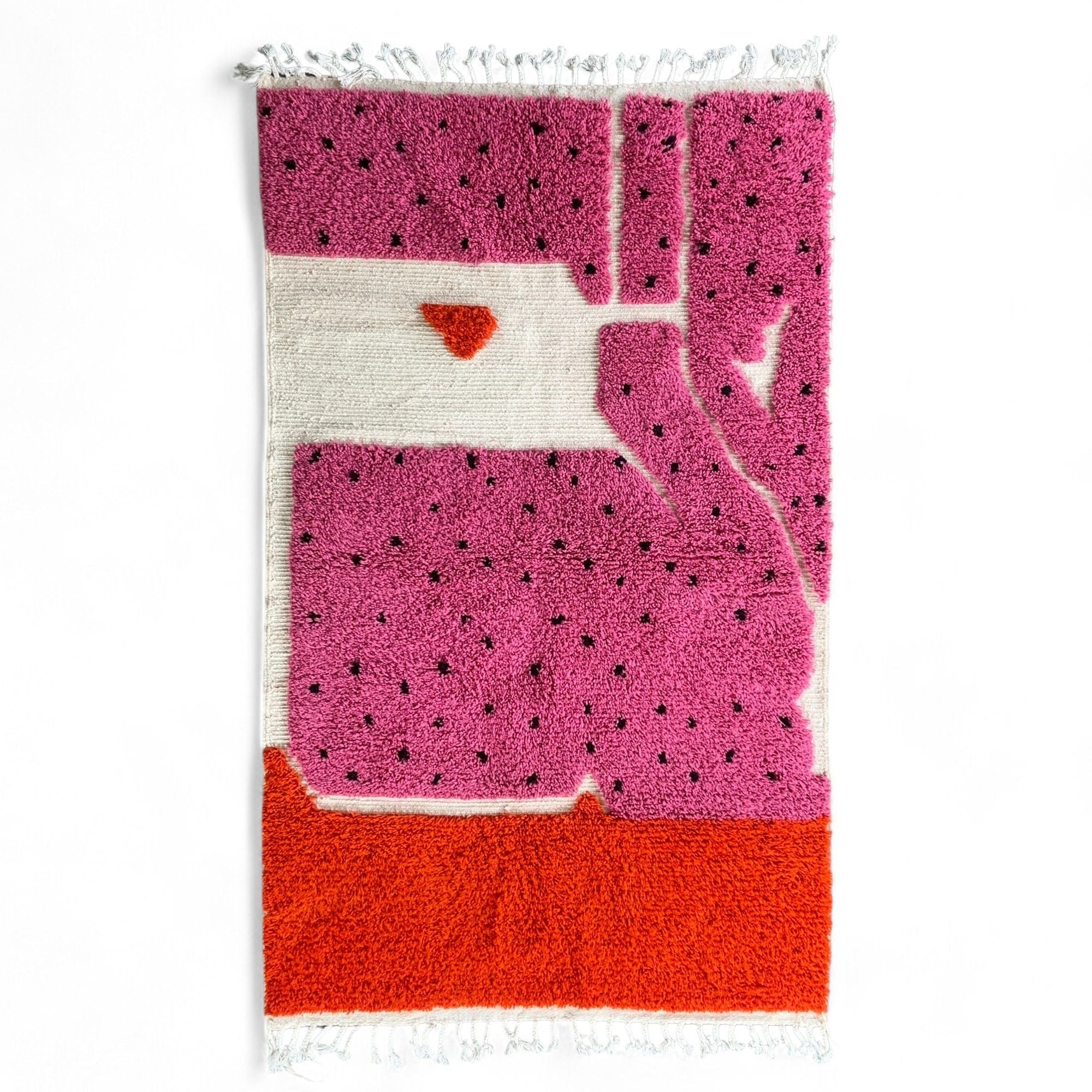 Melon Mirage pink Moroccan rug with a dotted design in black, handwoven by Berber artisans