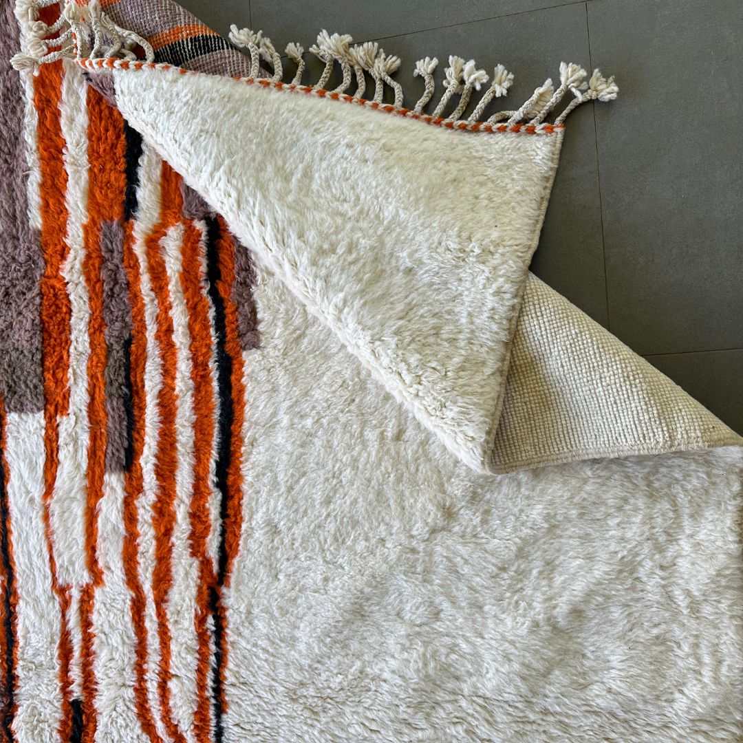 Moroccan Splendor custom Moroccan rug with a contemporary multicolor design on a white canvas, handcrafted by Berber artisans