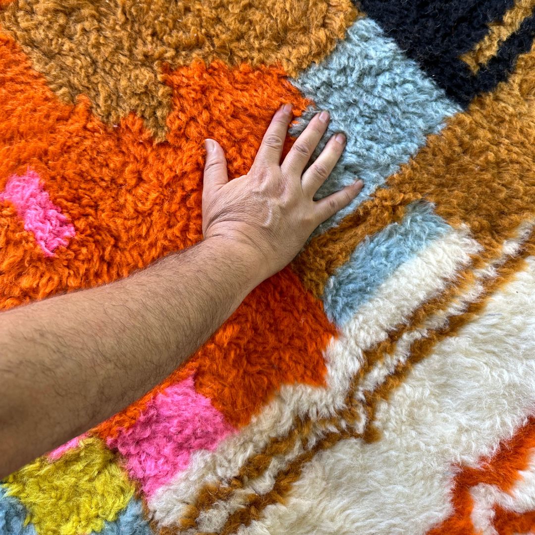 Moroccan Splendor custom Moroccan rug with a contemporary multicolor design on a white canvas, handcrafted by Berber artisans
