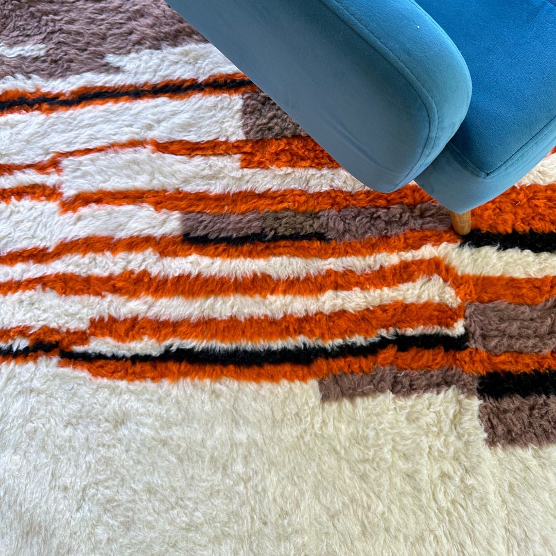 Moroccan Splendor custom Moroccan rug with a contemporary multicolor design on a white canvas, handcrafted by Berber artisans