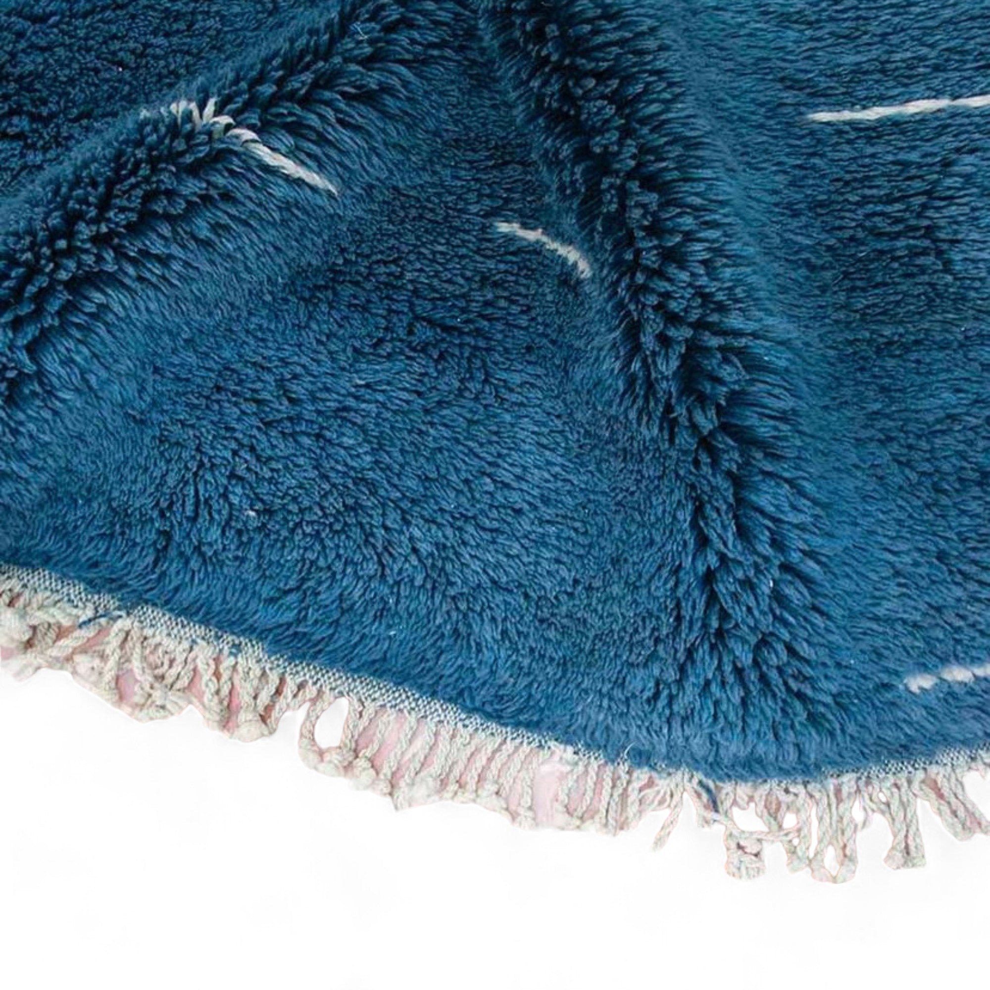 Oasis Elegance blue Moroccan rug with a white abstract design, handwoven by Berber artisans