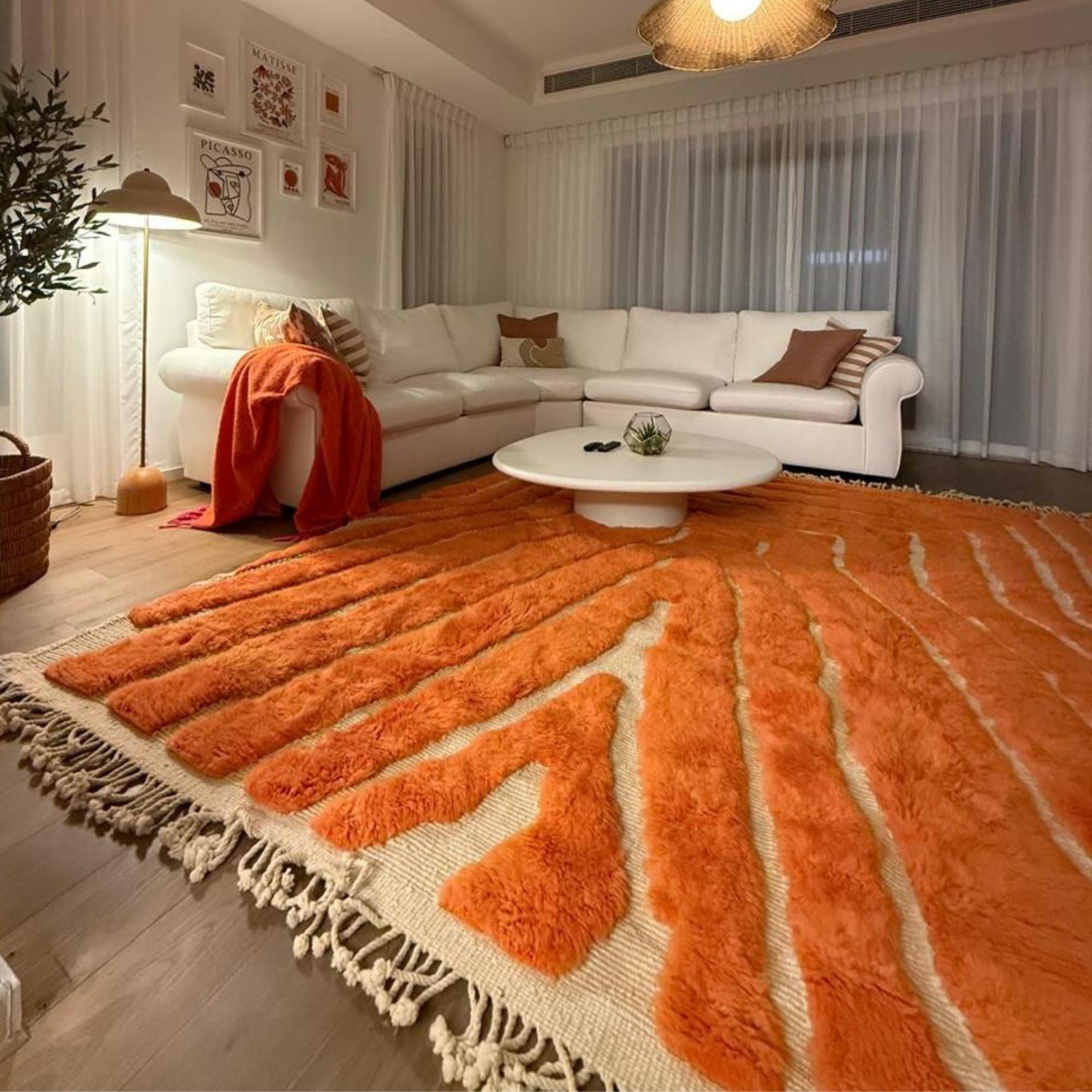 Sahara Symphony No. 01 styled in a modern living room showcasing its bold sculptural texture and vibrant orange colour.