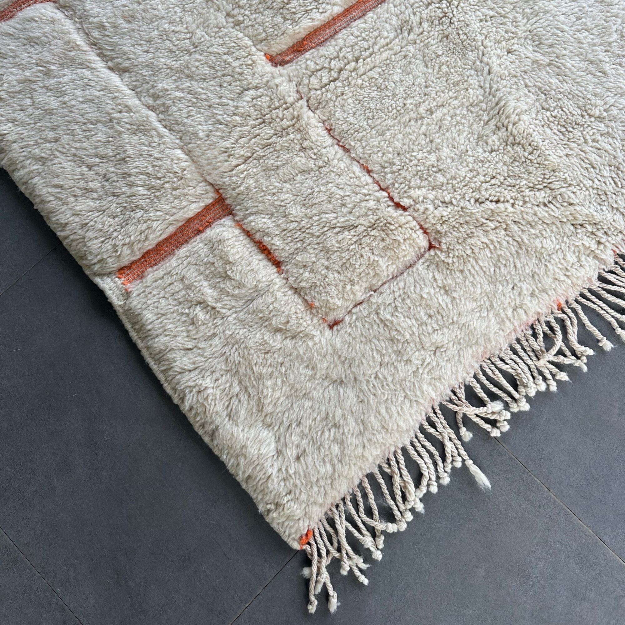 Solstice Serenity white Moroccan rug with a textured pink design, handwoven by Berber artisans