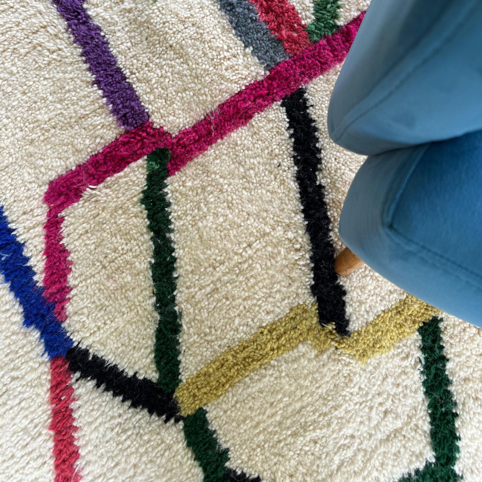Tranquil Trails white Moroccan rug with colorful contemporary design, handwoven by Berber artisans.