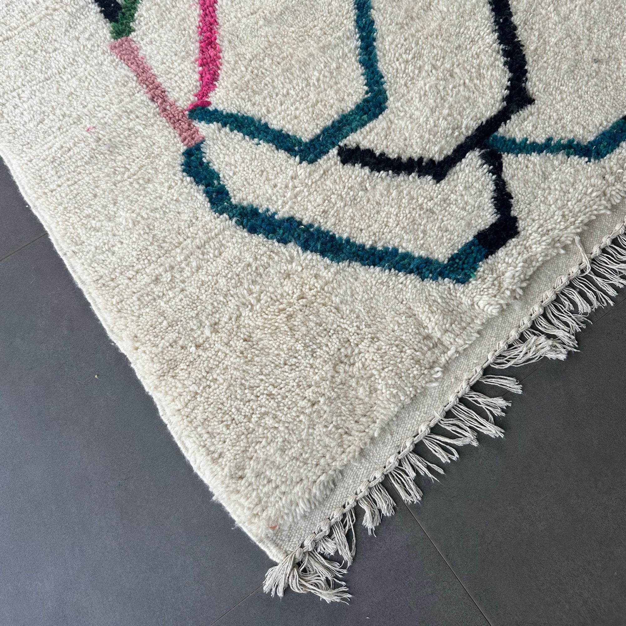 Tranquil Trails white Moroccan rug with colorful contemporary design, handwoven by Berber artisans.