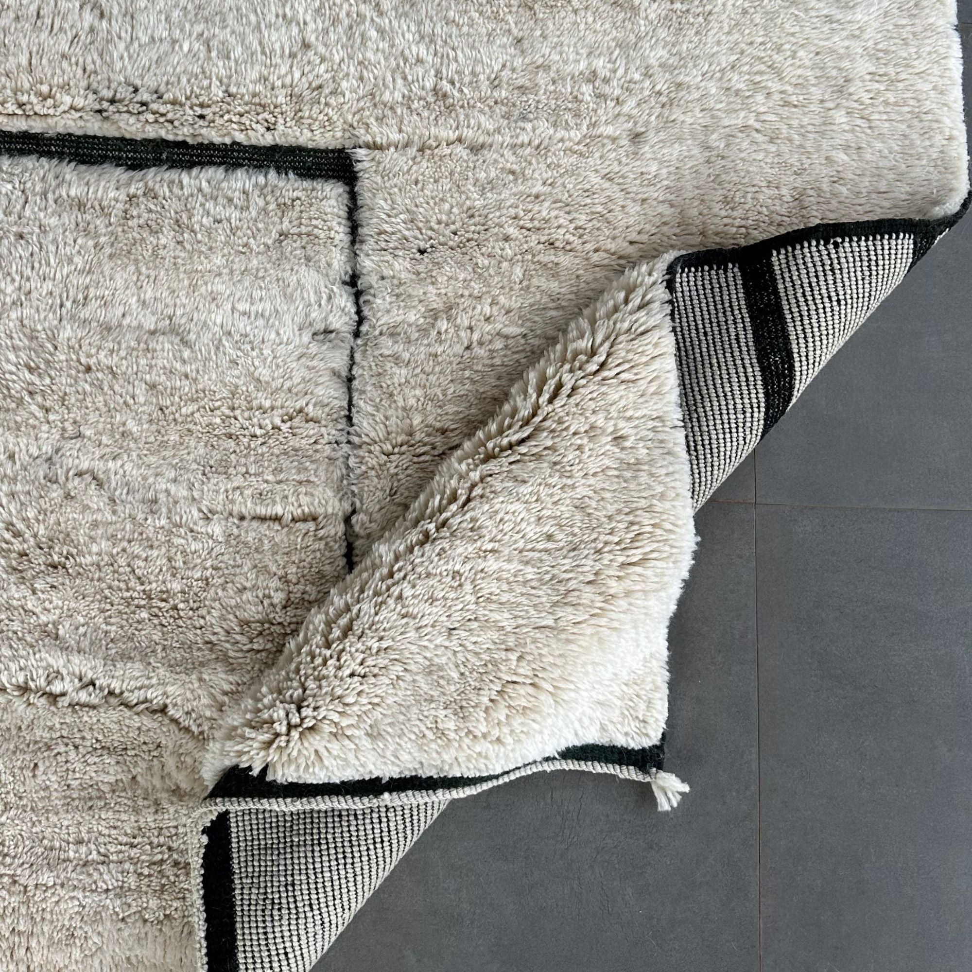 White Moroccan rug with black geometric texture