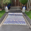 Whispering Willow Moroccan shag rug with a blue honeycomb design, handwoven by Berber artisans